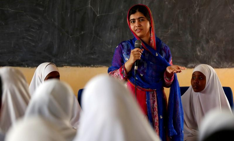 Pakistani Nobel Peace Prize laureate Malala Yousafzai addresses students at the Nasib Secondary School in Ifo2 area of Dadaab refugee camp during celebrations to mark her 19th birthday near the Kenya-Somalia border
